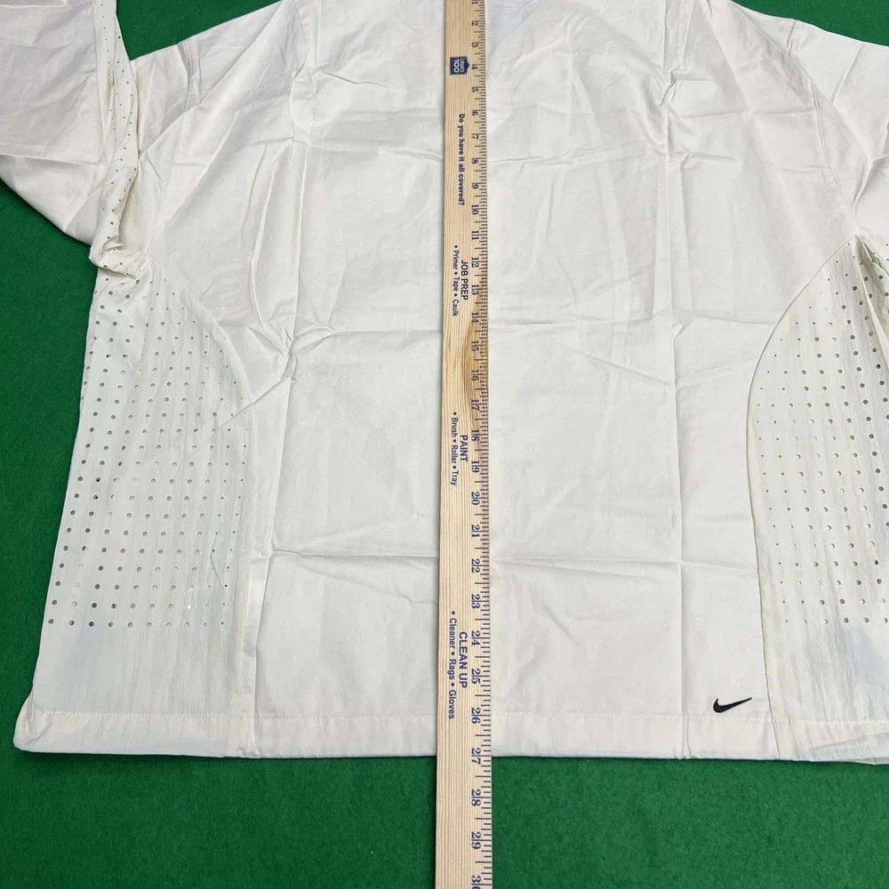 Nike tech button